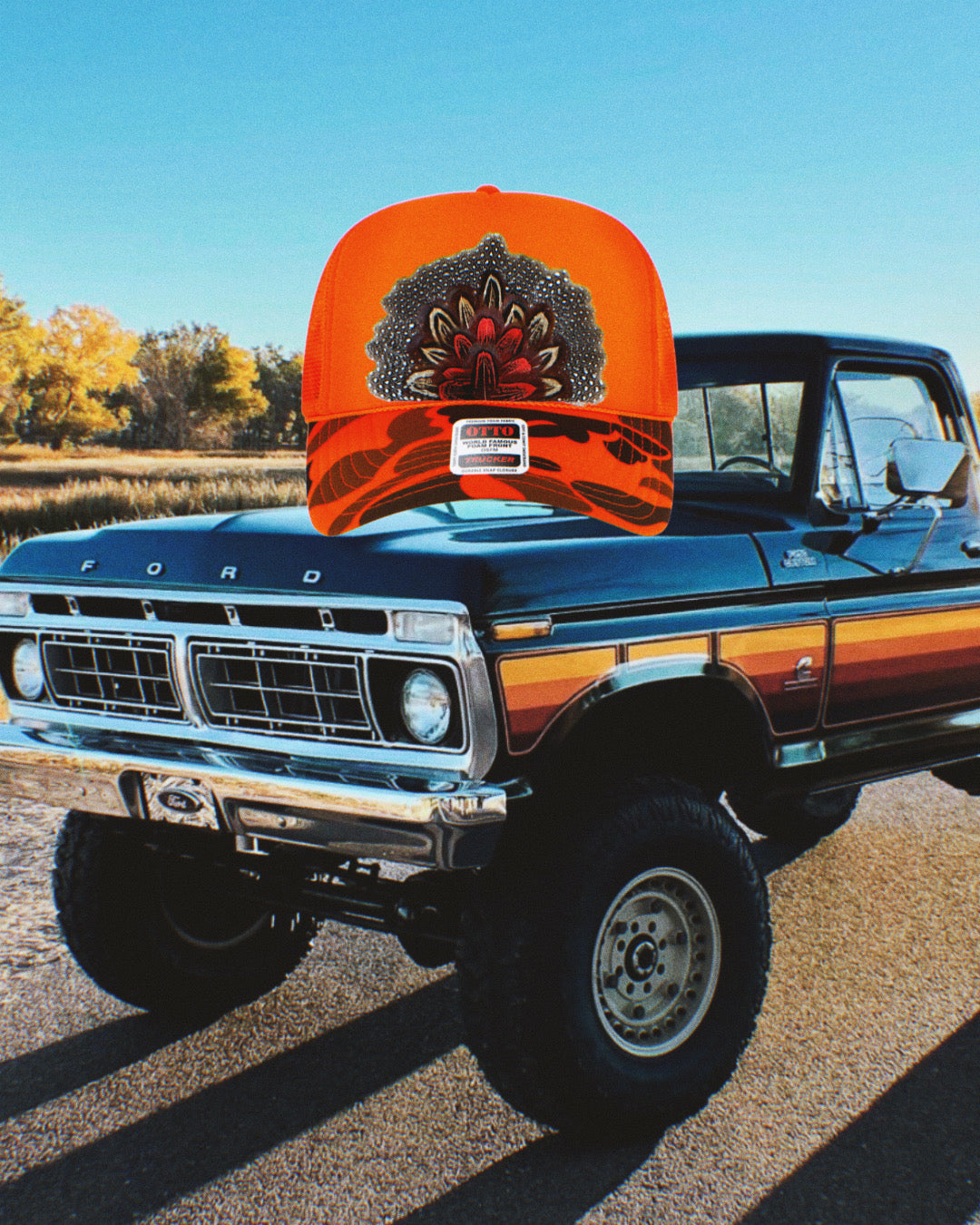 Neon Orange Camo Feather Trucker Hat
